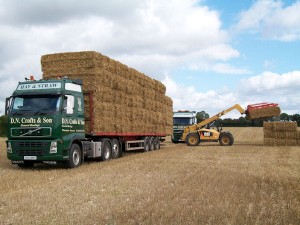 Straw bales loaded on to a transporter